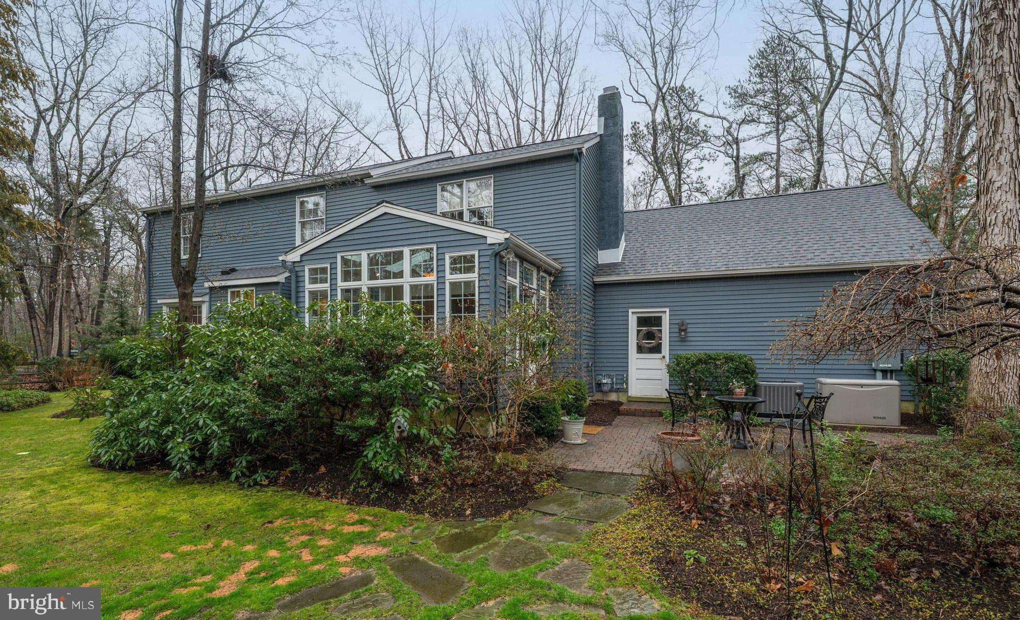 1 Strafford Circle Road Medford, NJ 08055 - Photo 26 of 31 a front view of a house with garden