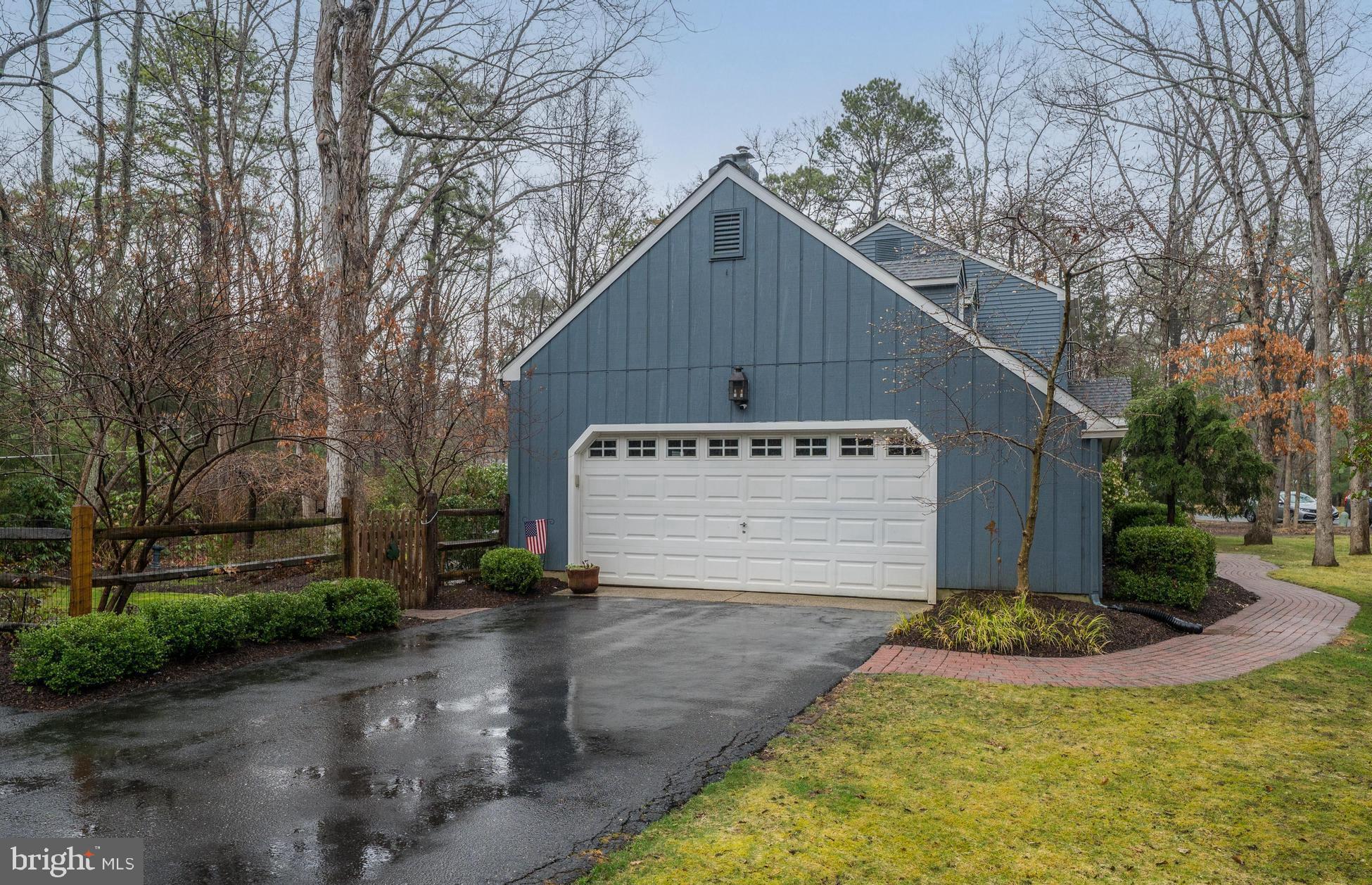 1 Strafford Circle Road Medford, NJ 08055 - Photo 31 of 31 a view of a house with a yard and garage