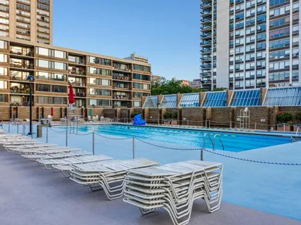 a view of a patio with table and chairs and potted plants