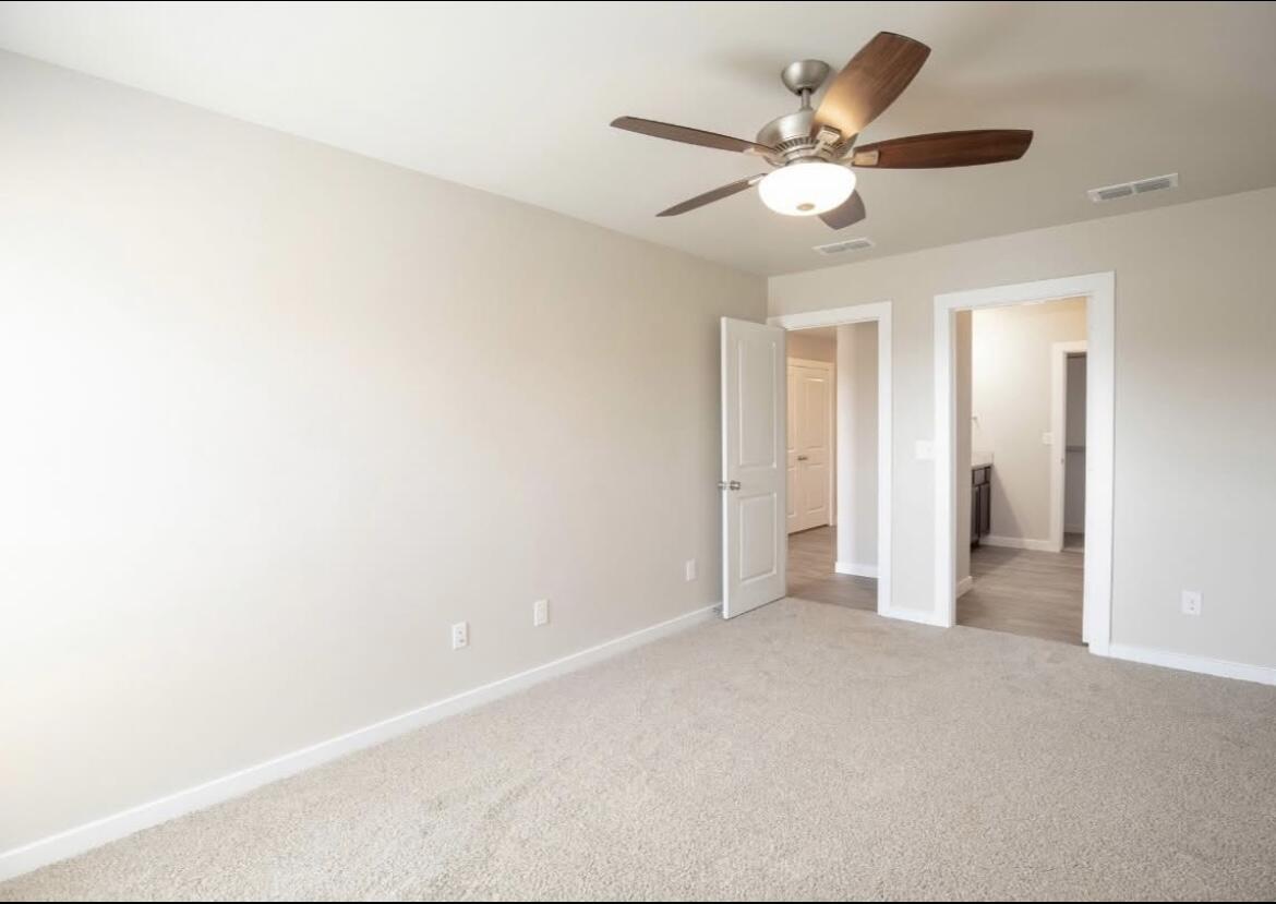 2410 144th Street, Unit 12 Lubbock, TX 79423 - Photo 6 of 13 a view of an empty room