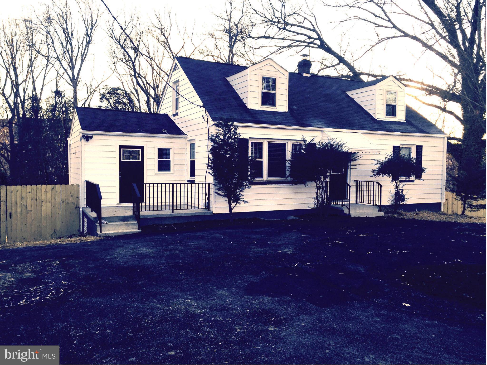 9911 Old Fort Road Fort Washington, MD 20744 - Photo 1 of 25 a view of a house with a tree