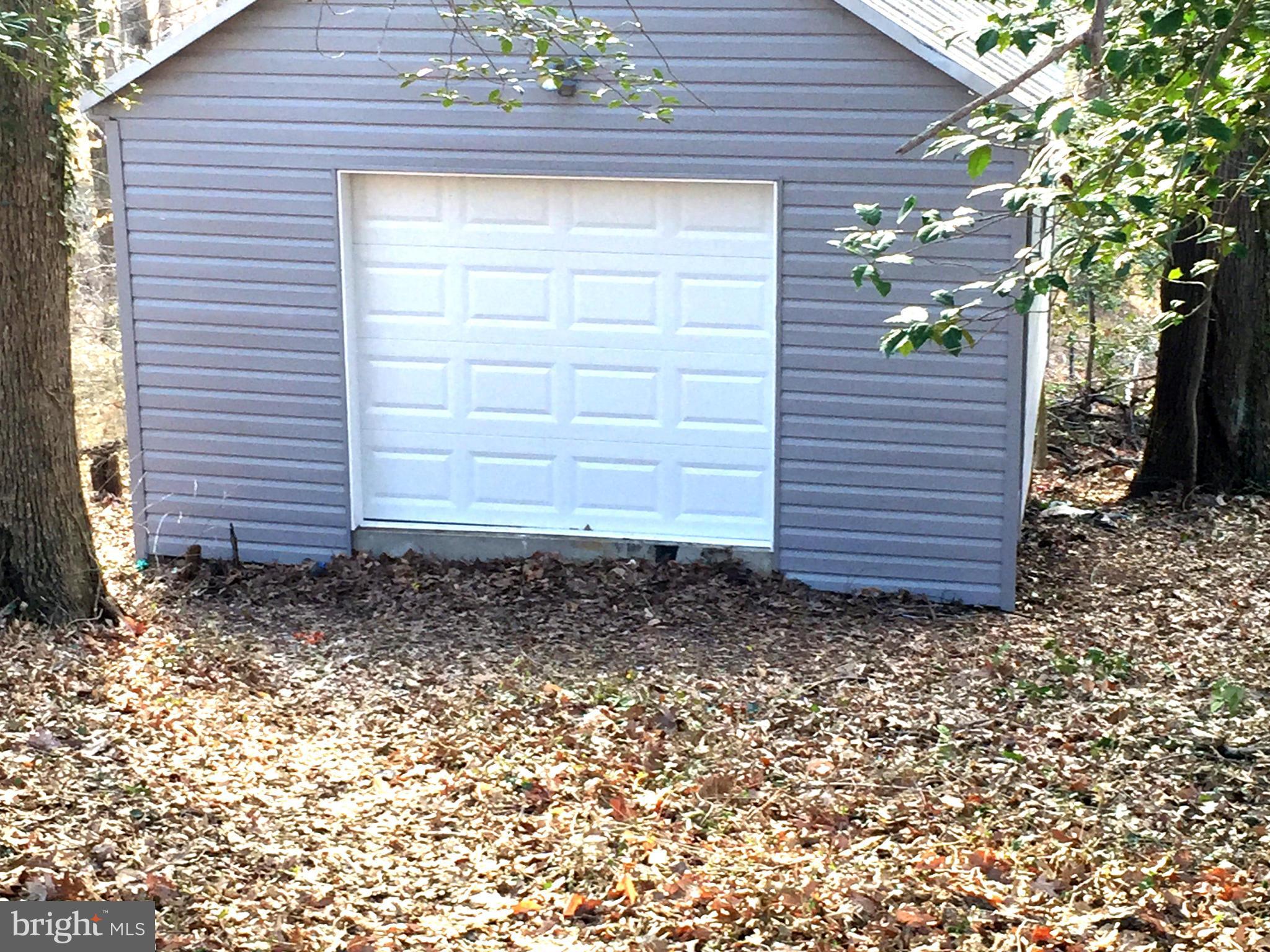 9911 Old Fort Road Fort Washington, MD 20744 - Photo 23 of 25 a view of a house with a yard