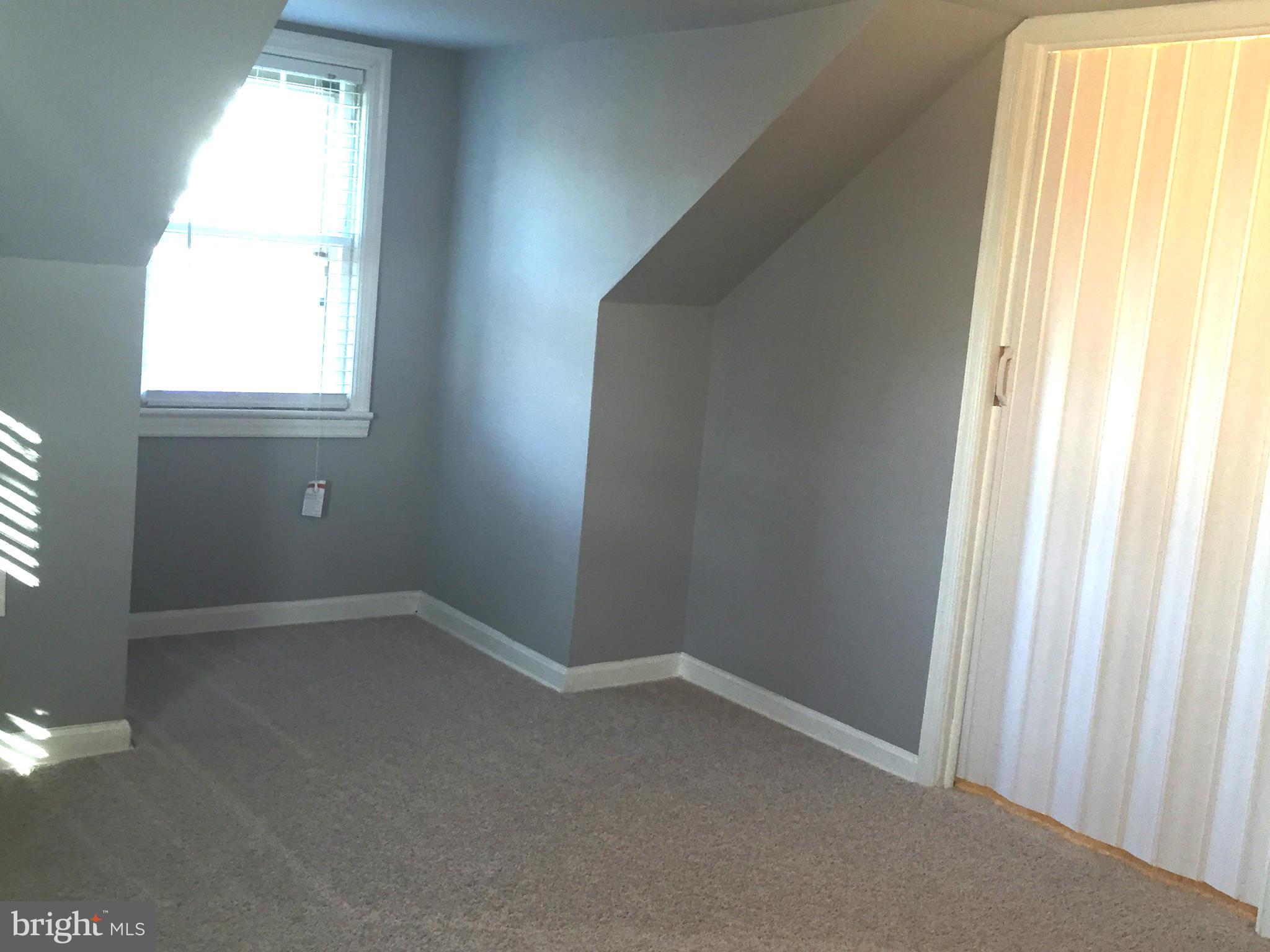 9911 Old Fort Road Fort Washington, MD 20744 - Photo 9 of 25 an empty room with a window