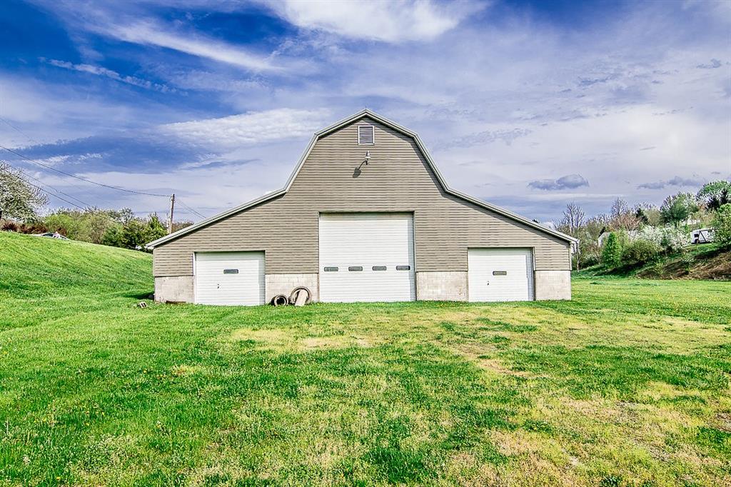0 Ciaffoni McDonald, PA 15317 - Photo 16 of 50 a house with huge green field in front of it