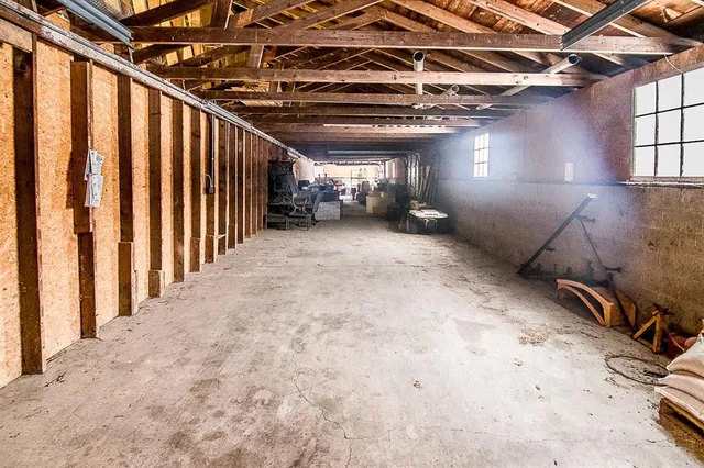 a view of a room with wooden roof