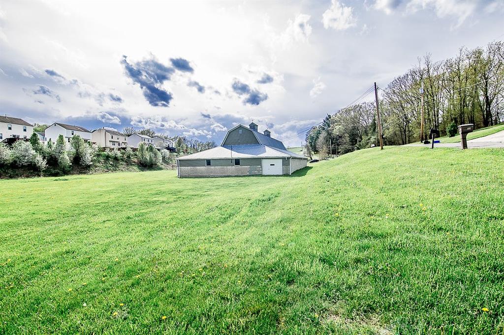 0 Ciaffoni McDonald, PA 15317 - Photo 3 of 50 a view of a house with a big yard and a large tree