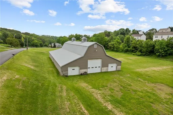 a view of a lake with a yard