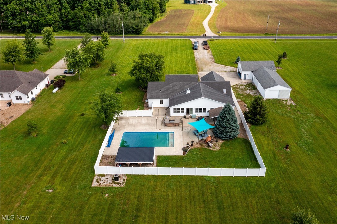 47147 Merriam Road Wellington, OH 44090 - Photo 3 of 49 Aerial view of sparsely populated area with a pool