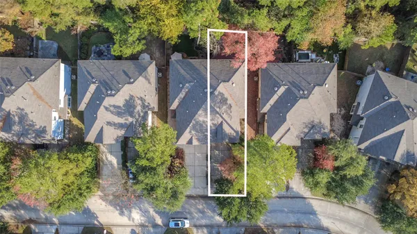 aerial view of a house with a garden