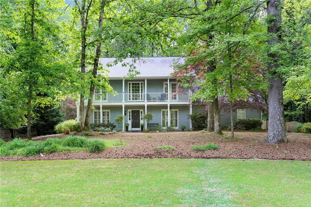 2475 Roxburgh Drive Roswell, GA 30076 - Photo 1 of 1 Nestled among mature shade trees.