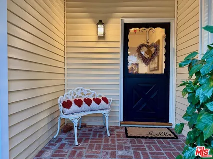 a potted plant sitting on a brick wall