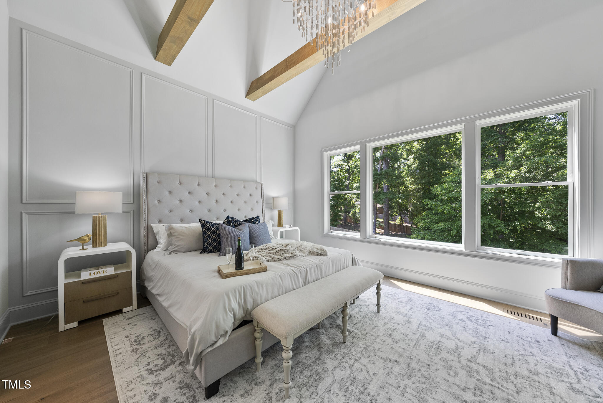 5307 Dixon Drive Raleigh, NC 27609 - Photo 13 of 48 a bed room with a bed and a couch