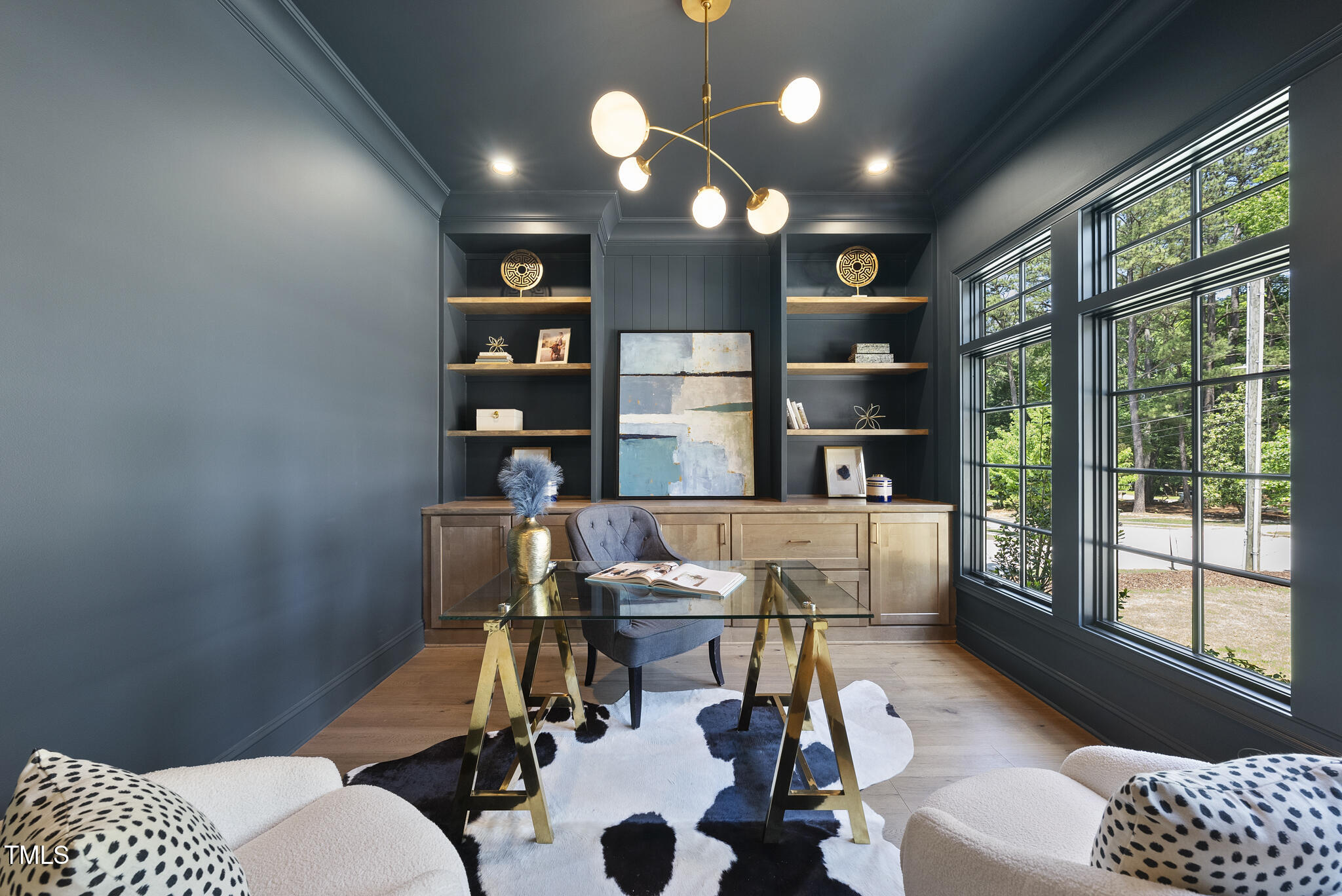 5307 Dixon Drive Raleigh, NC 27609 - Photo 21 of 48 a living room with furniture a floor to ceiling window and floor to ceiling window
