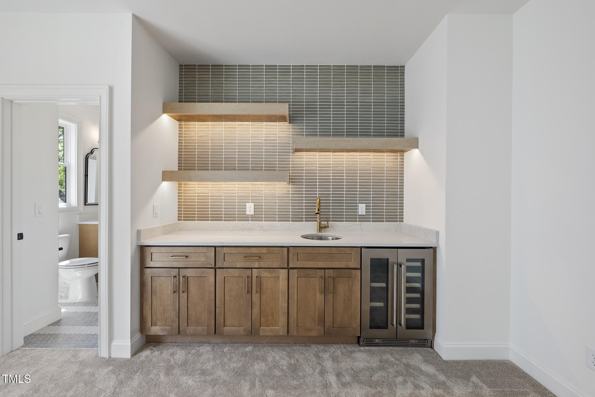 5307 Dixon Drive Raleigh, NC 27609 - Photo 25 of 48 a bathroom with a sink and a toilet