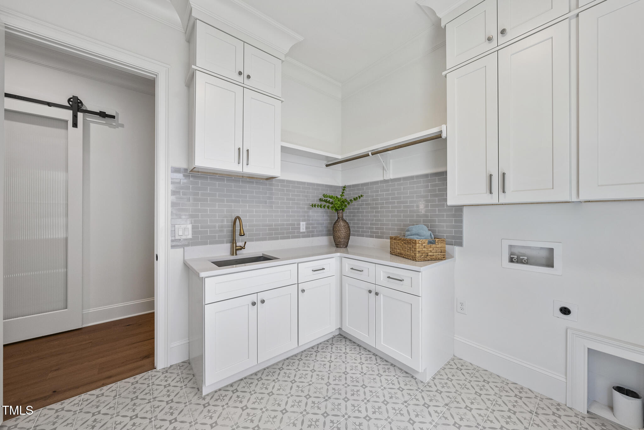 5307 Dixon Drive Raleigh, NC 27609 - Photo 40 of 48 a kitchen with a sink and cabinets