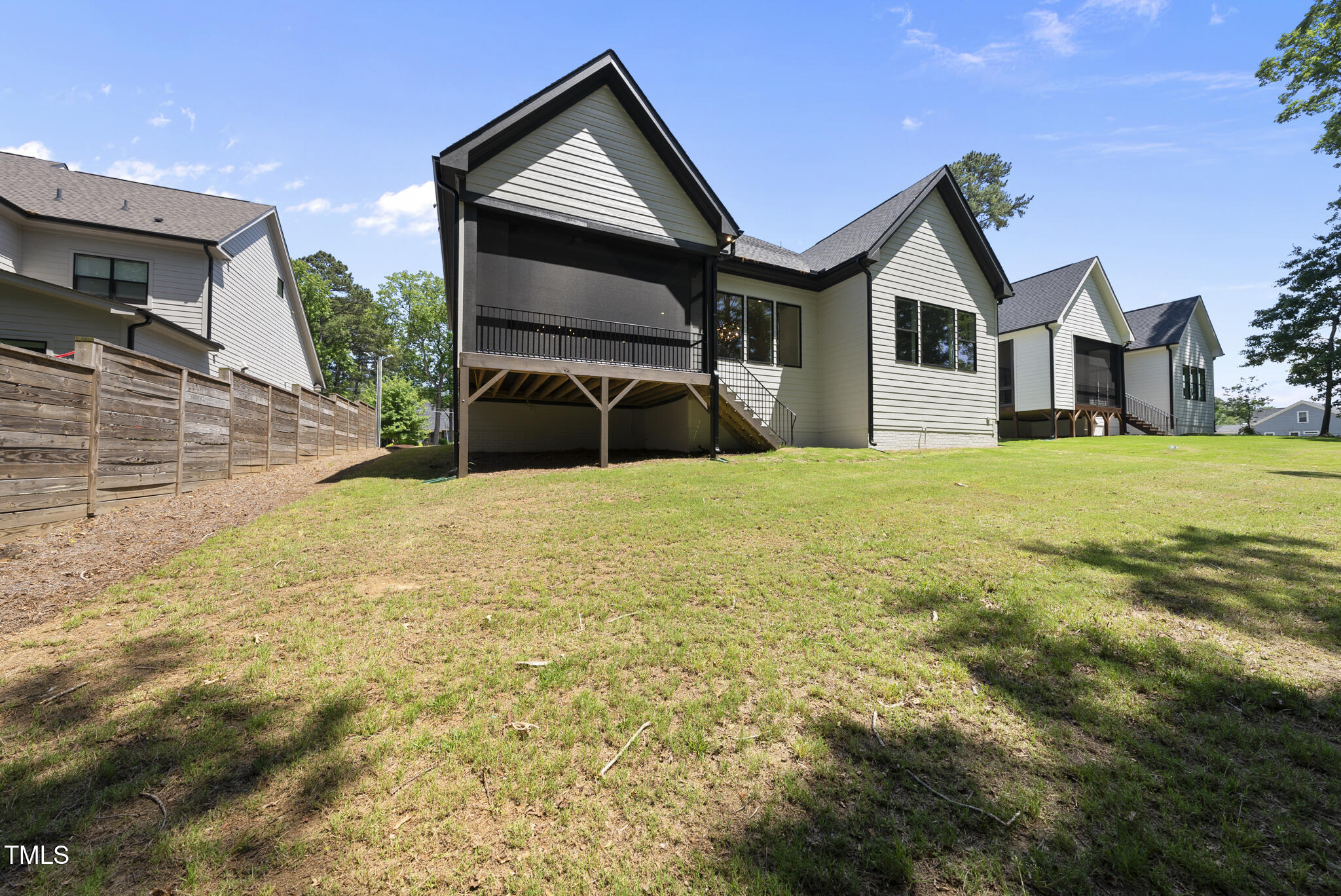 5307 Dixon Drive Raleigh, NC 27609 - Photo 44 of 48 a view of a house with a yard and garage