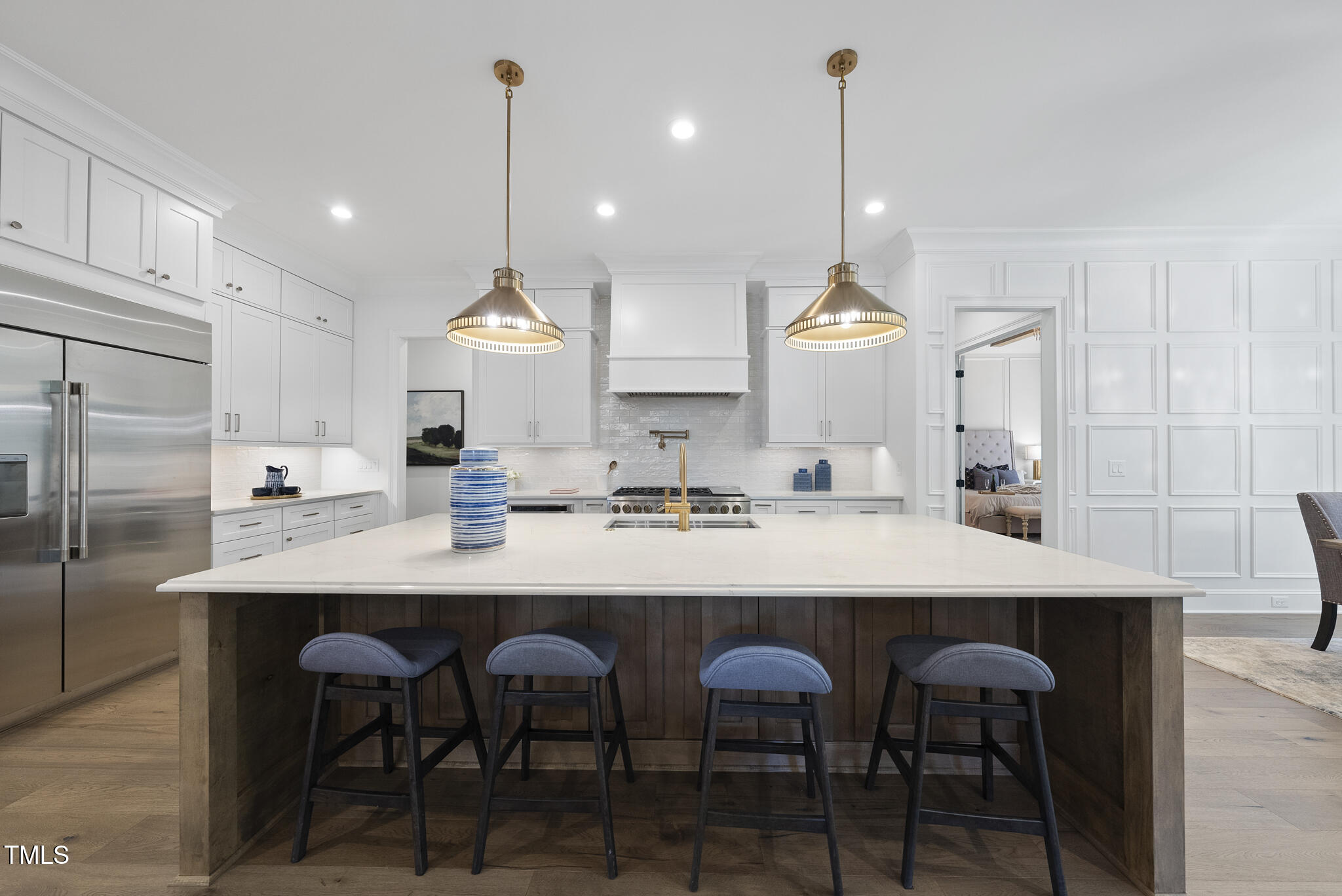 5307 Dixon Drive Raleigh, NC 27609 - Photo 5 of 48 a kitchen with kitchen island granite countertop a sink a center island and cabinets