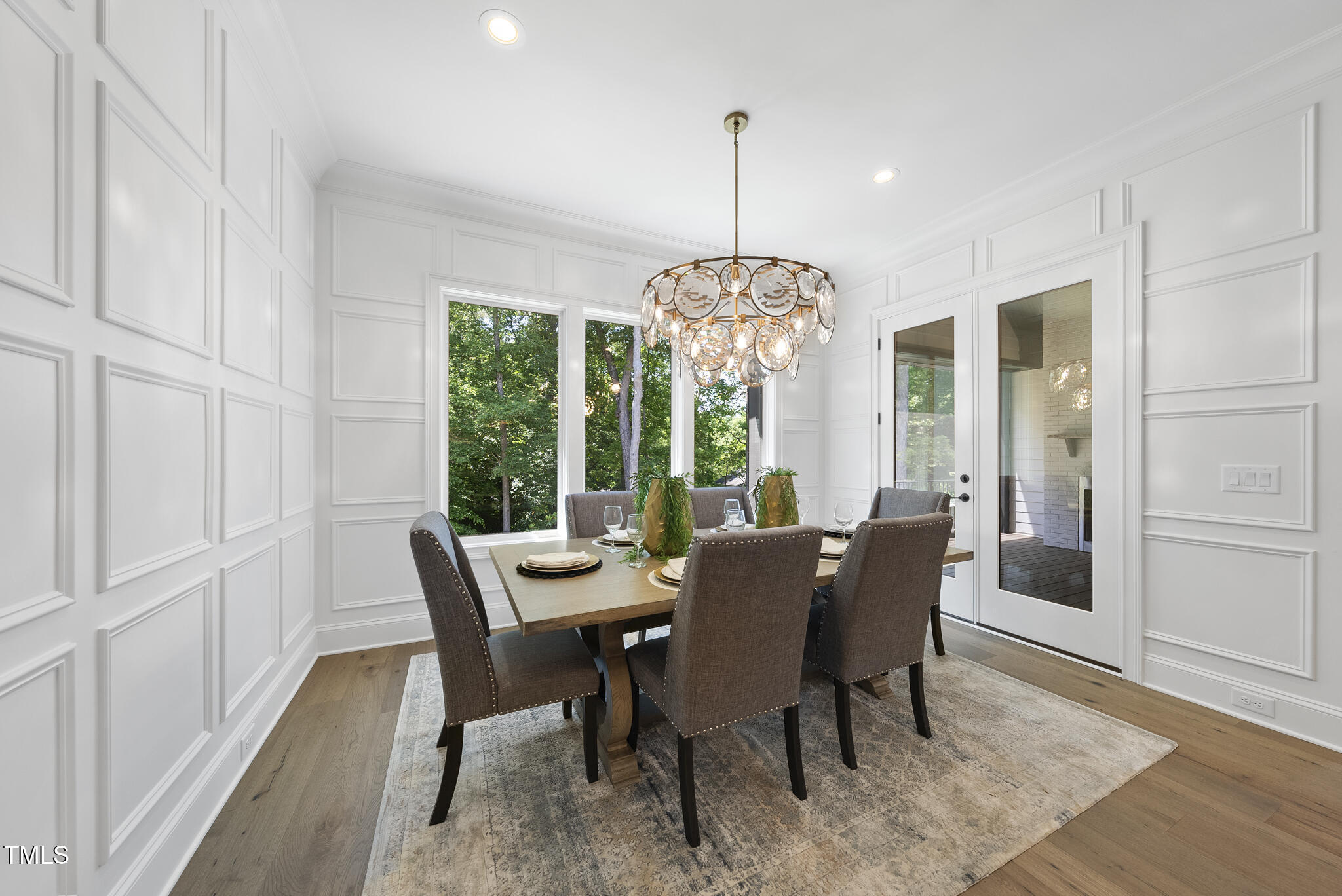 5307 Dixon Drive Raleigh, NC 27609 - Photo 9 of 48 a view of a dining room with furniture window and wooden floor