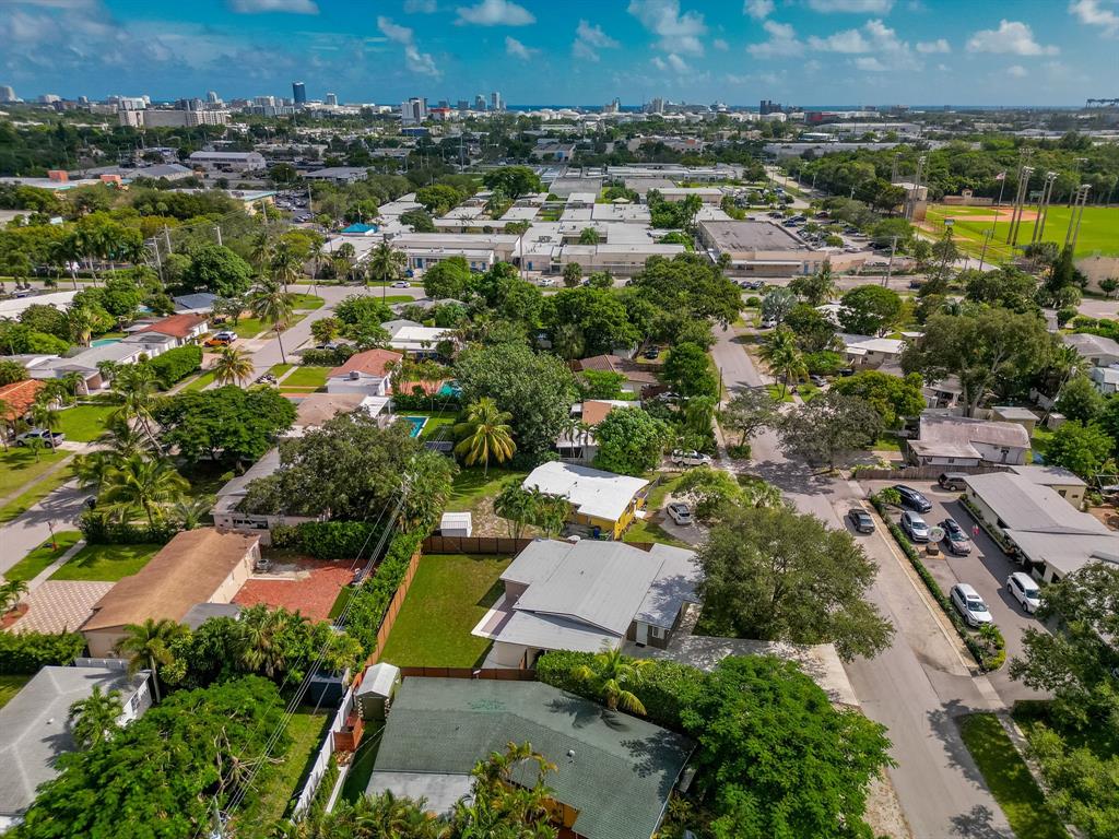 823 Southwest 27th Street Fort Lauderdale, FL 33315 - Photo 47 of 56 an aerial view of residential houses with outdoor space and trees