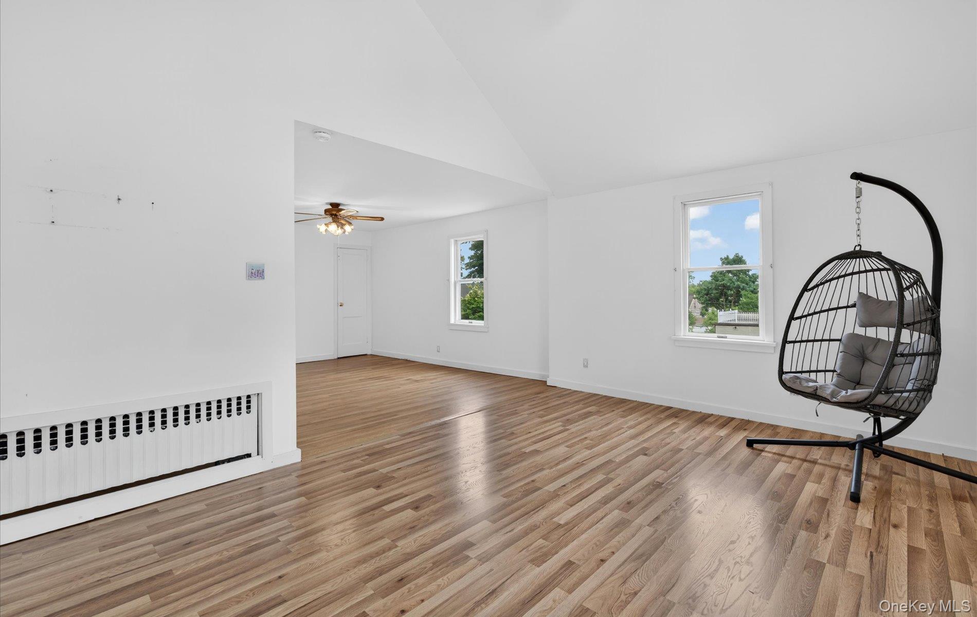 24 Purdue Road Glen Cove, NY 11542 - Photo 27 of 41 a view of a room with wooden floor mirror and window