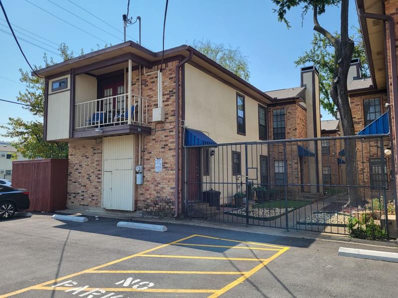 a front view of a house with a garage
