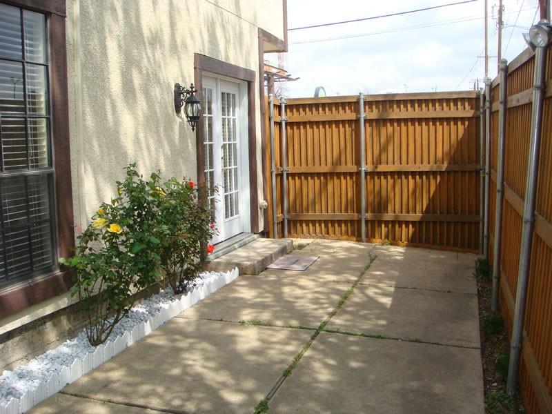 4000 Rawlins Street, Unit 105 Dallas, TX 75219 - Photo 26 of 26 a view of a balcony with a pot
