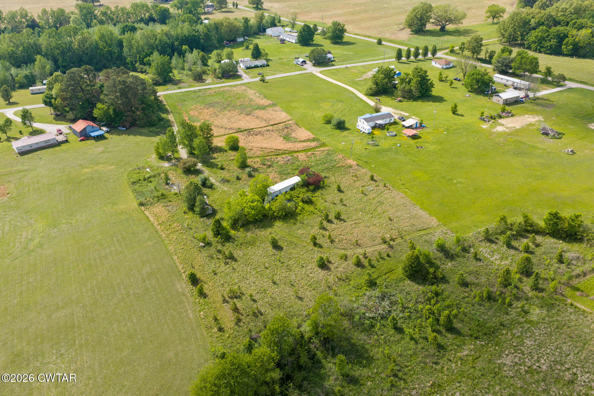 119 Lawrence Road Lexington, TN 38351 - Photo 15 of 20 a view of a houses with a big yard