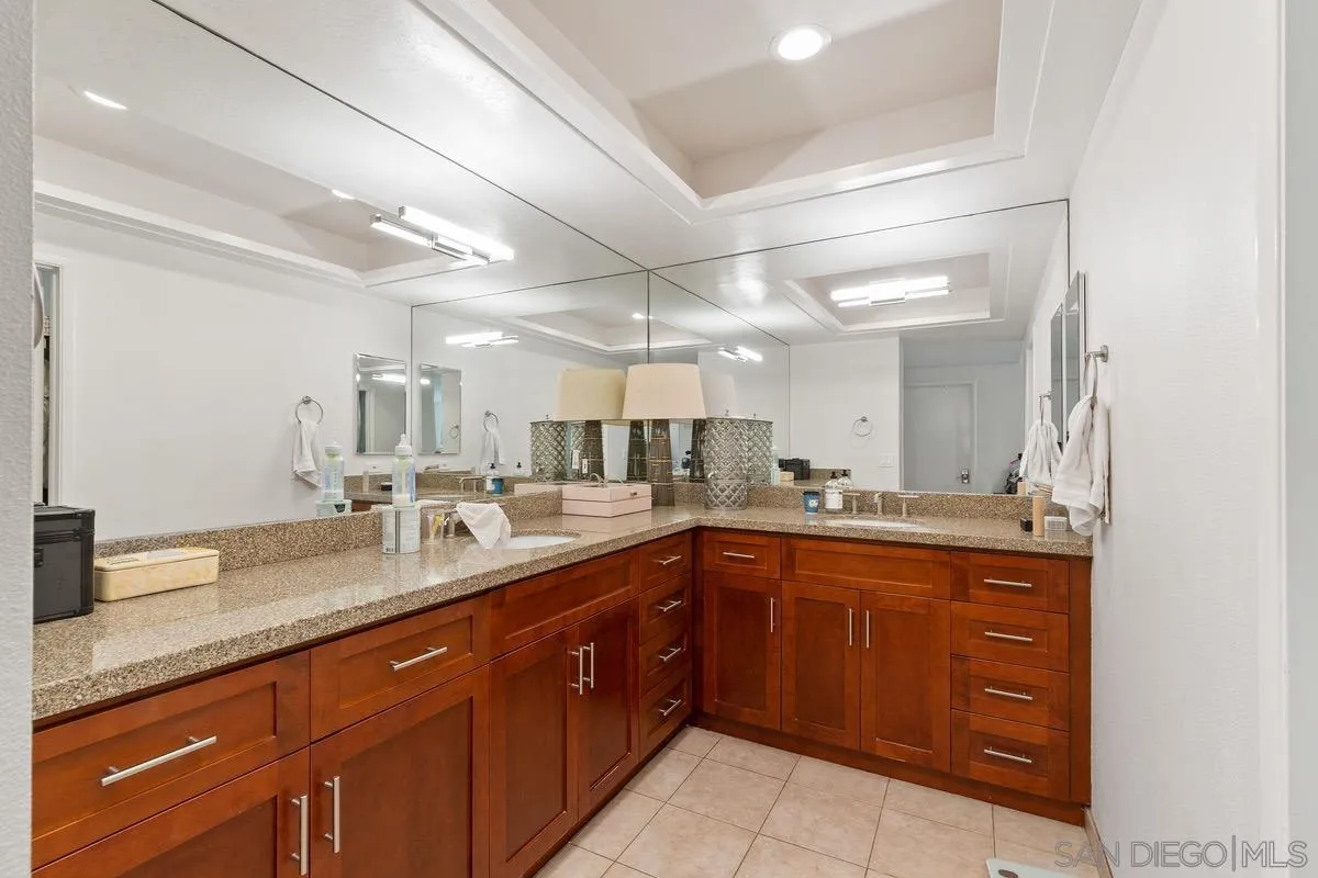 6729 Avenida Andorra La Jolla, CA 92037 - Photo 14 of 27 a large bathroom with a sink and mirror