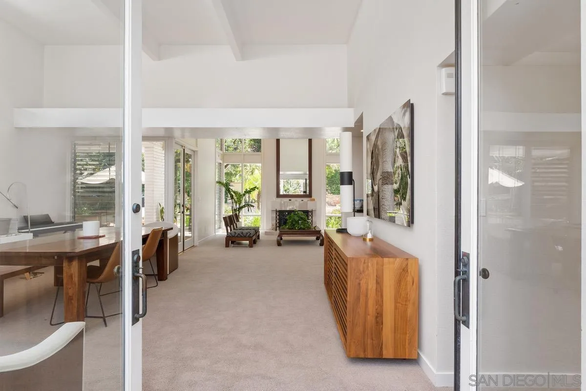 6729 Avenida Andorra La Jolla, CA 92037 - Photo 3 of 27 a living room with furniture and a large window