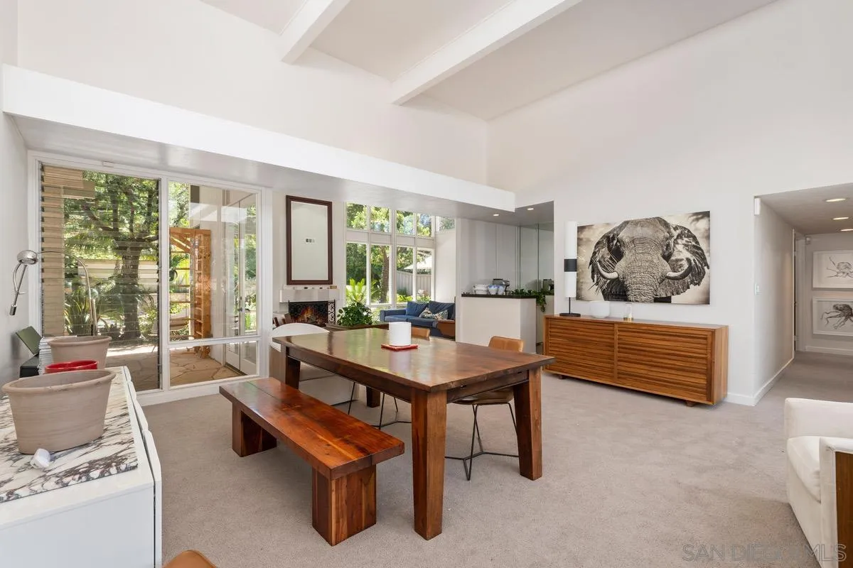 6729 Avenida Andorra La Jolla, CA 92037 - Photo 6 of 27 a living room with furniture and a floor to ceiling window