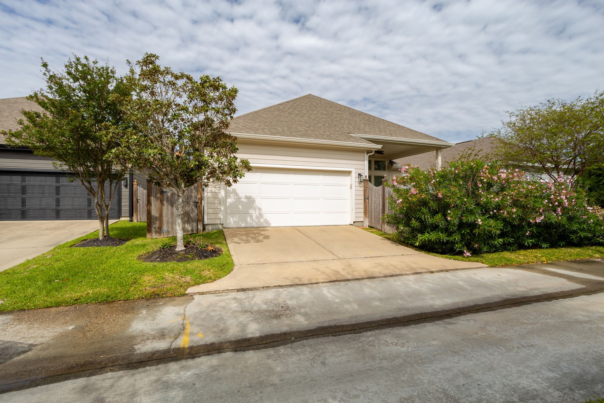 16650 Seminole Ridge Drive Cypress, TX 77433 - Photo 26 of 27 a front view of a house with a yard and garage