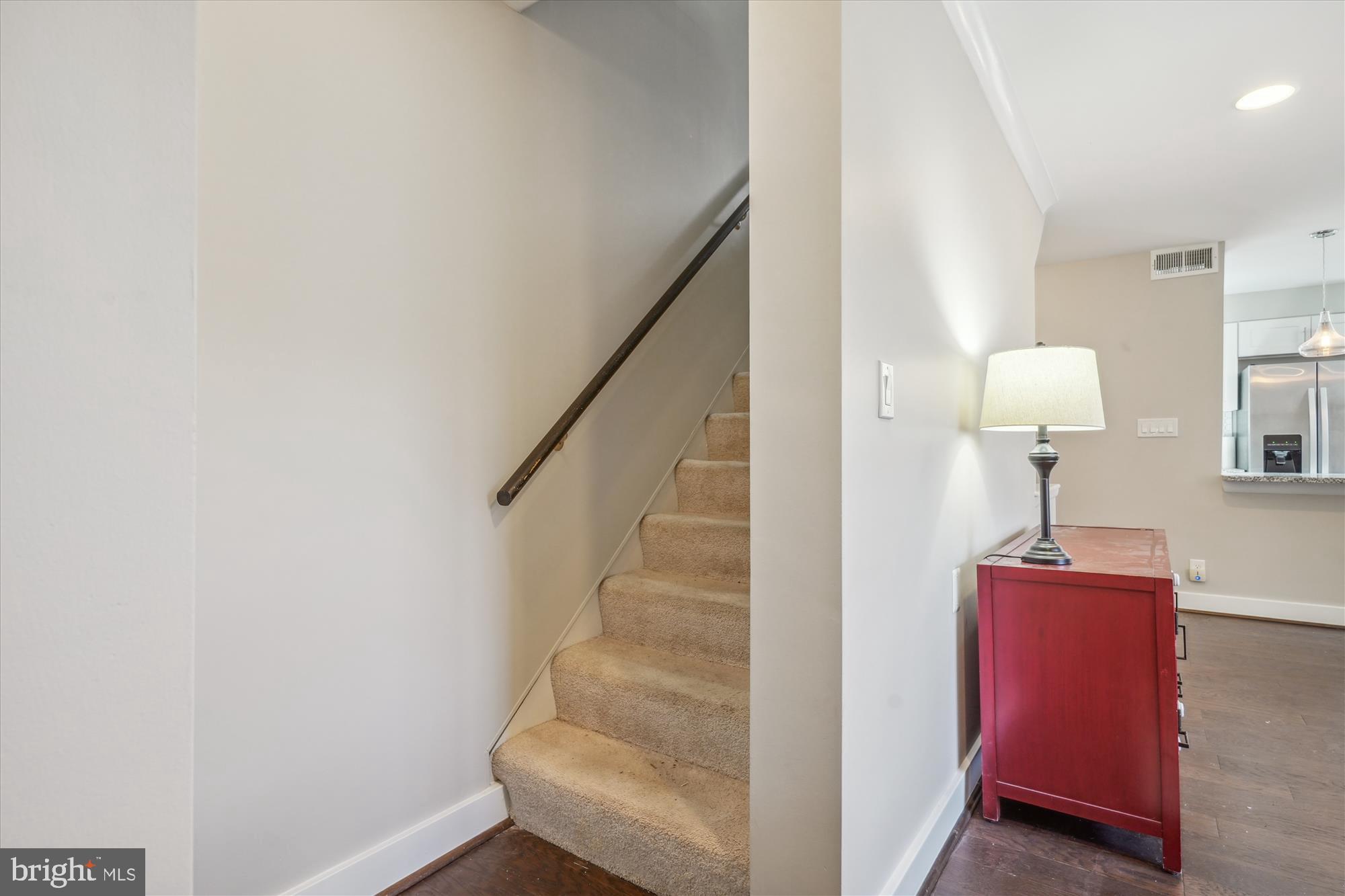 4613 28th Road South, Unit C Arlington, VA 22206 - Photo 14 of 37 a view of entryway and hall with wooden floor