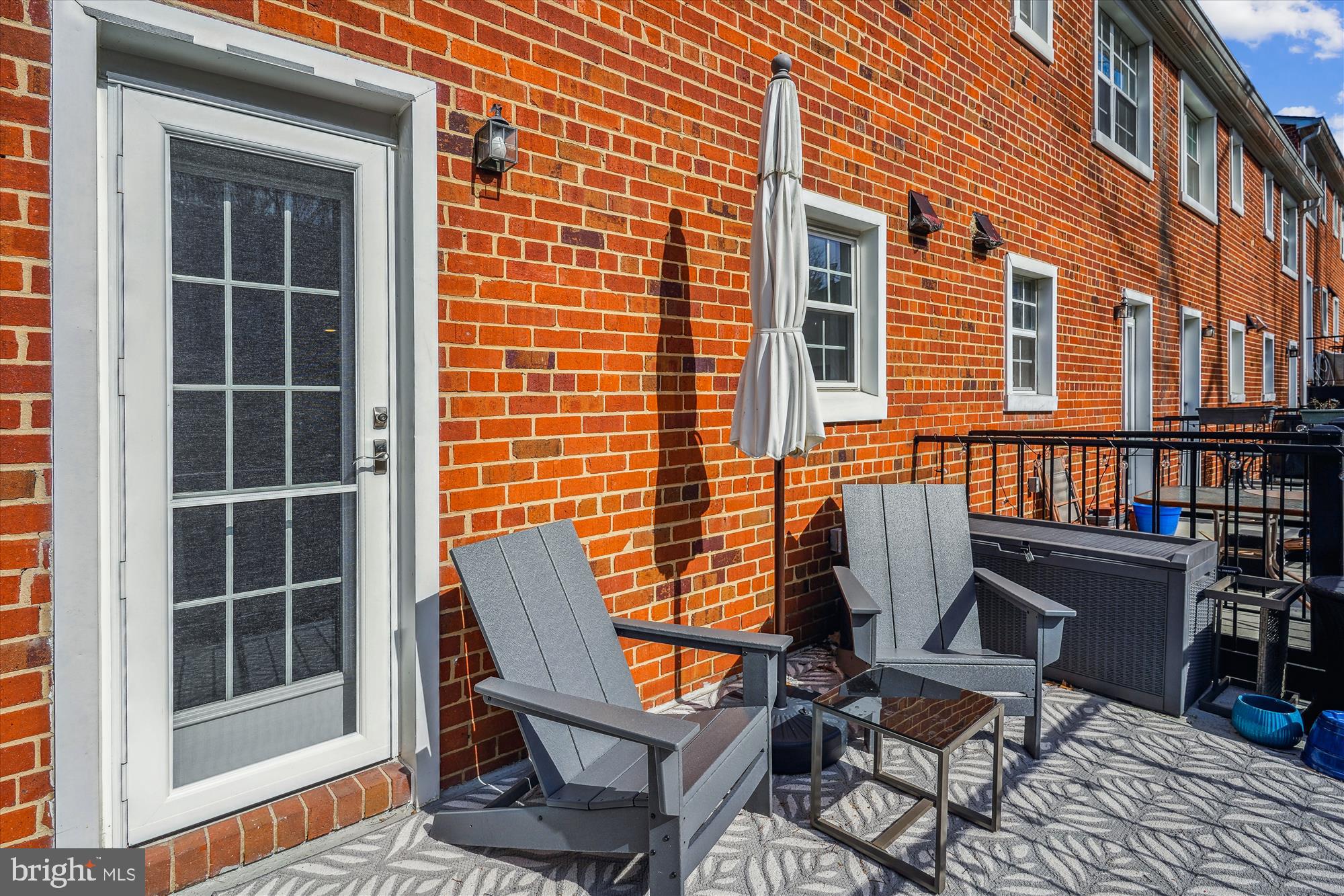 4613 28th Road South, Unit C Arlington, VA 22206 - Photo 27 of 37 a view of a chair and table in the balcony