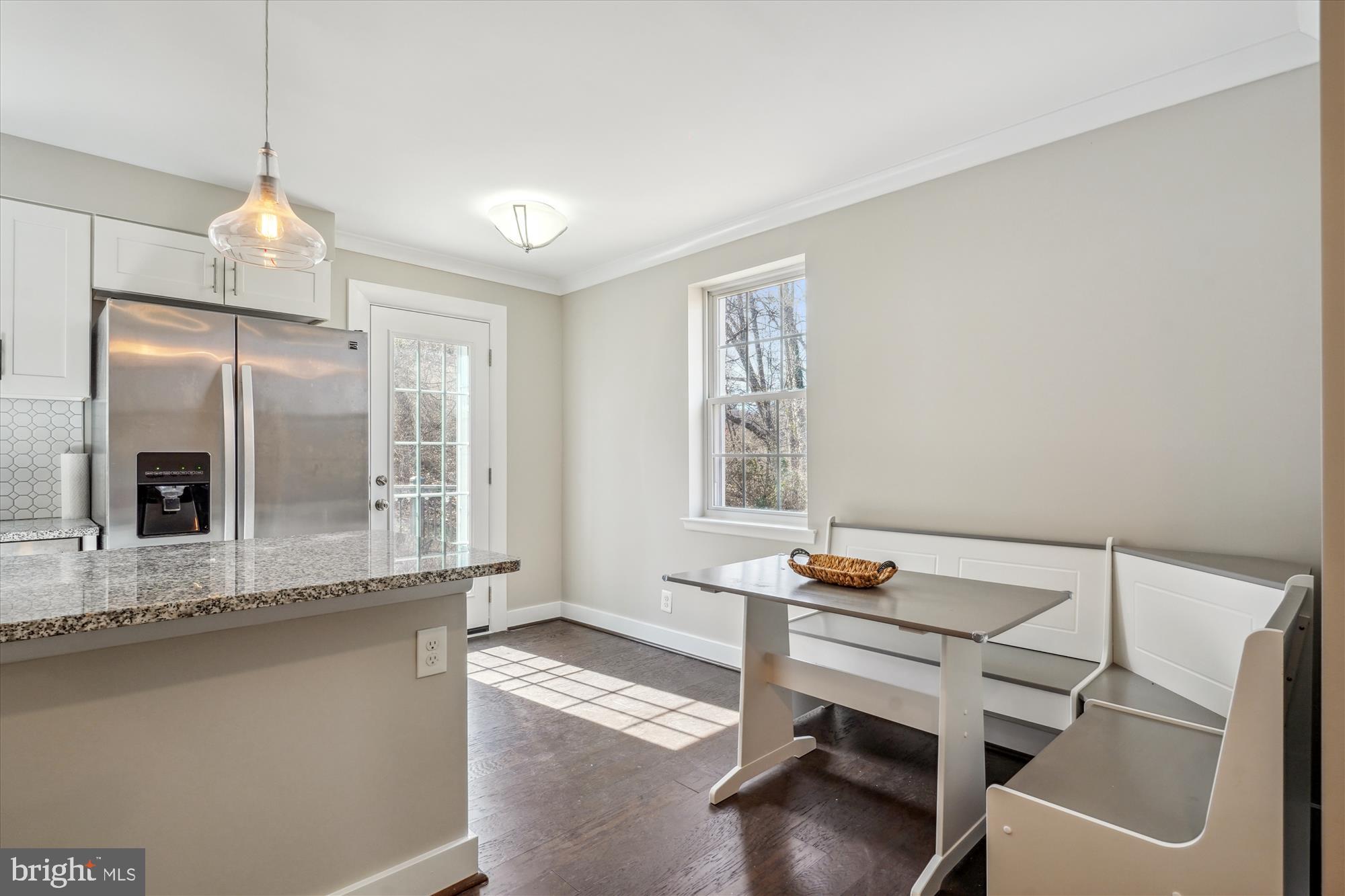 4613 28th Road South, Unit C Arlington, VA 22206 - Photo 9 of 37 a dining room with furniture and window
