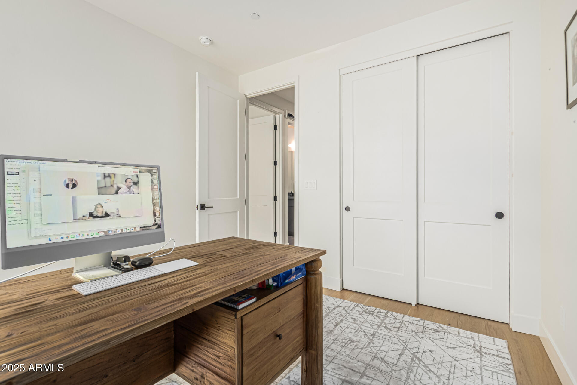 5151 North 13th Place, Unit 12 Phoenix, AZ 85014 - Photo 19 of 31 a view of room with wooden floor