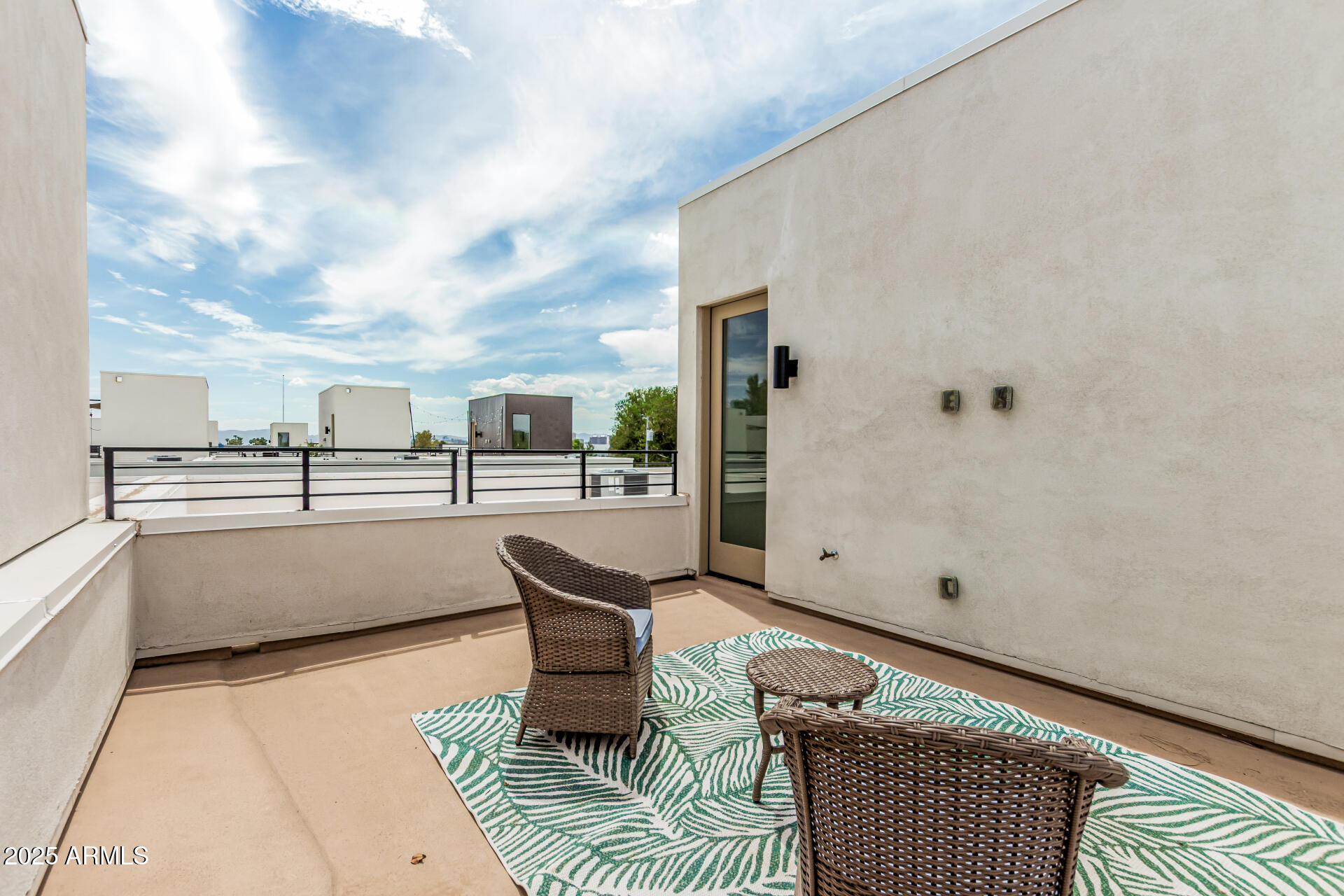 5151 North 13th Place, Unit 12 Phoenix, AZ 85014 - Photo 24 of 31 a view of balcony with couch