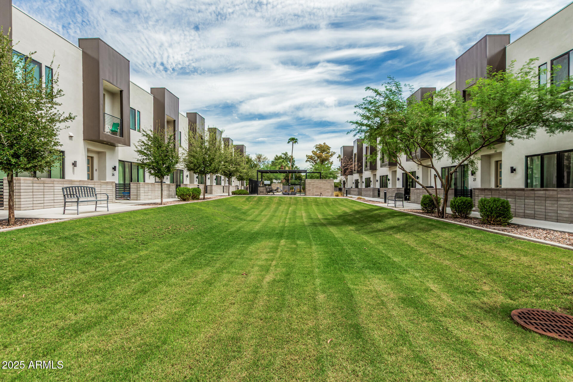 5151 North 13th Place, Unit 12 Phoenix, AZ 85014 - Photo 26 of 31 a view of a house with a big yard and large trees