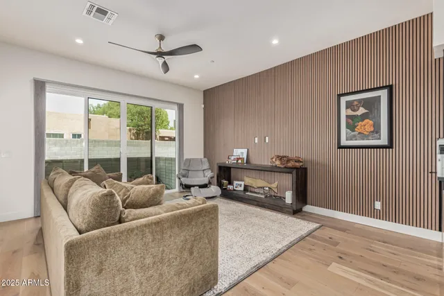 a living room with furniture and a table
