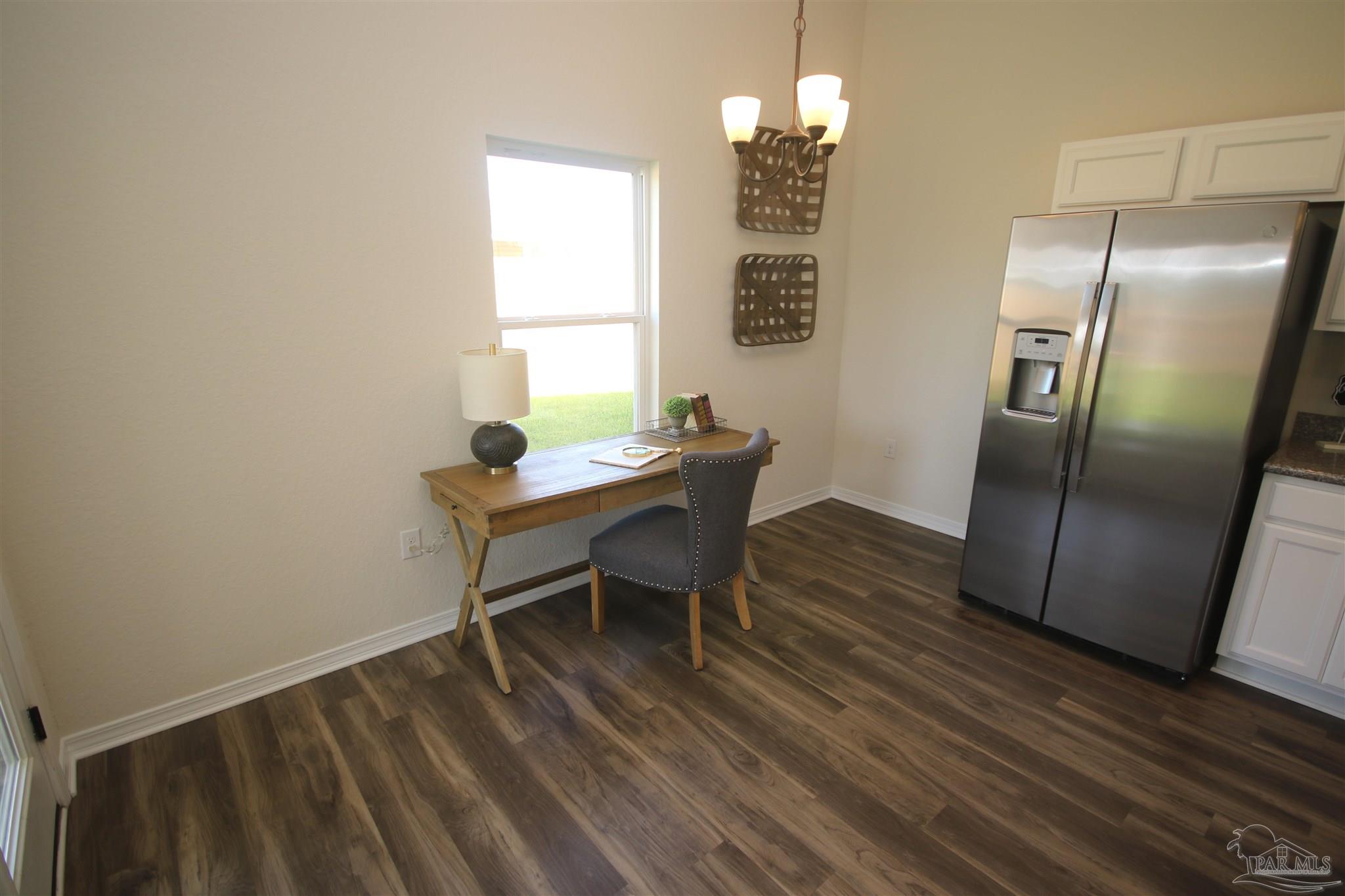 5747 Peach Drive Pace, FL 32571 - Photo 14 of 65 left open up to the 8 x 9.6 covered patio.