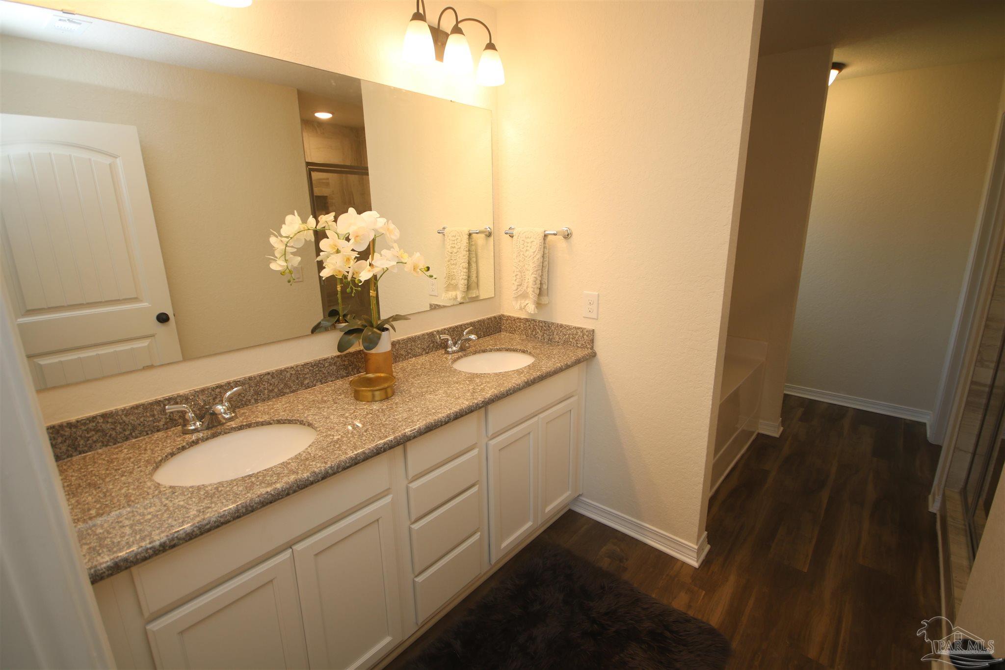 5747 Peach Drive Pace, FL 32571 - Photo 30 of 65 countertops & comfort height vanity.