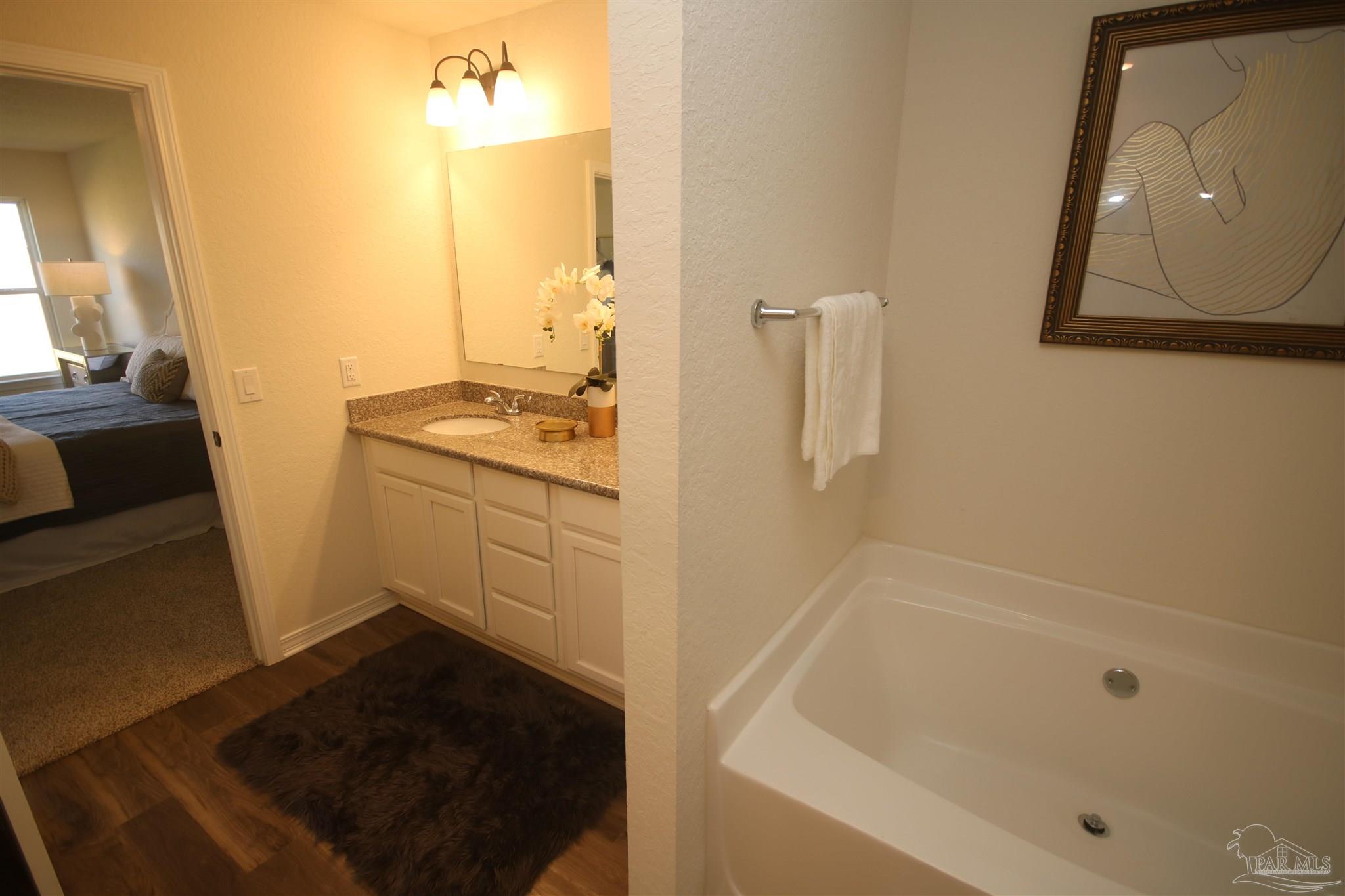 5747 Peach Drive Pace, FL 32571 - Photo 36 of 65 Easy to maintain Luxury Vinyl Flooring.