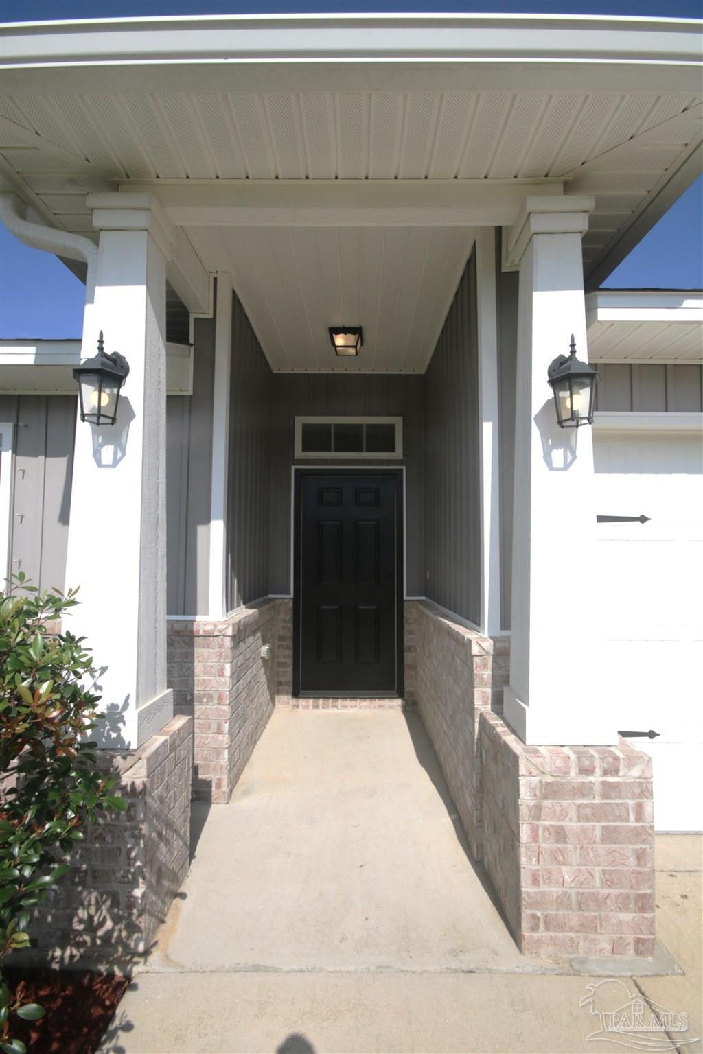 5747 Peach Drive Pace, FL 32571 - Photo 52 of 65 door inside & out. New dead bolt & door handle.