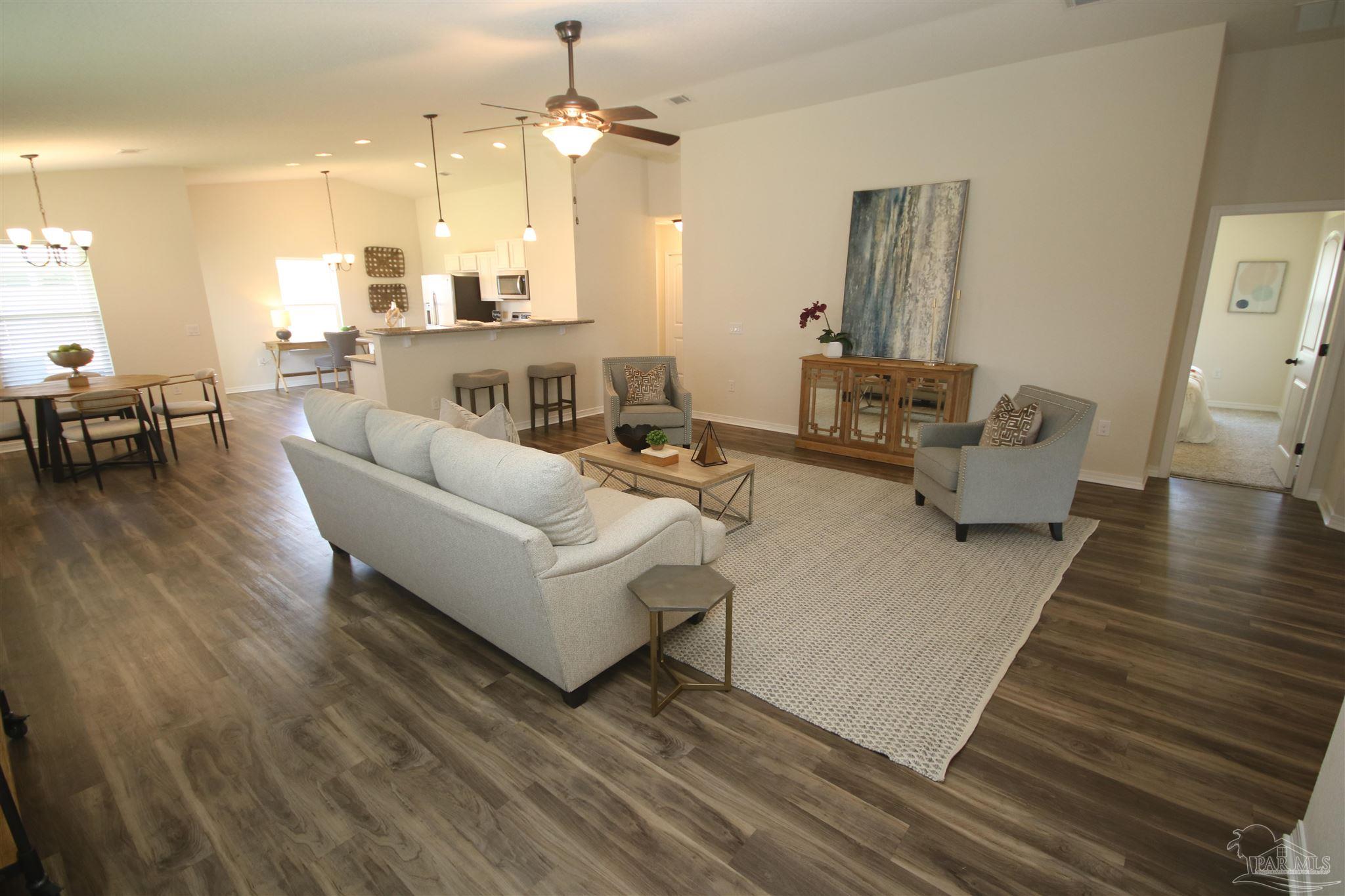 5747 Peach Drive Pace, FL 32571 - Photo 6 of 65 & the 2nd bedroom to the far right.