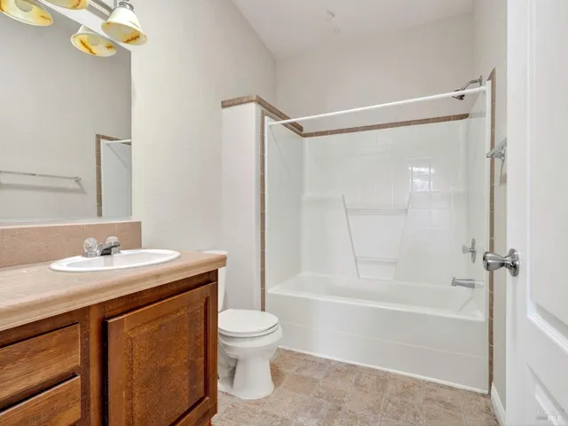 a view of balcony with wooden floor and fence