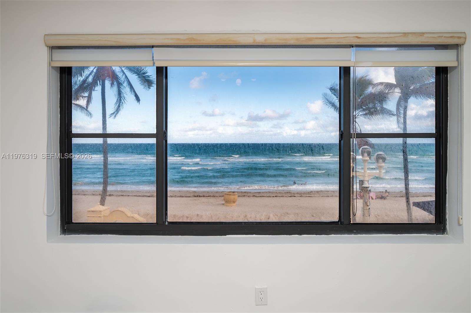 3300 North Surf Road, Unit 26A Hollywood, FL 33019 - Photo 3 of 19 a view of a door window of the house
