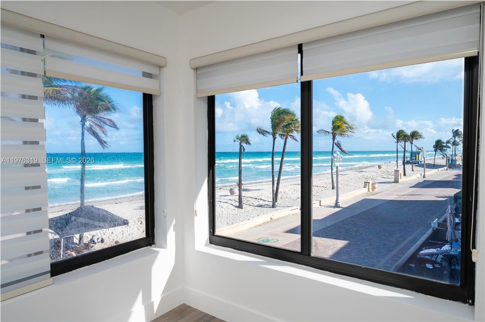 3300 North Surf Road, Unit 26A Hollywood, FL 33019 - Photo 6 of 19 a view of a floor to ceiling window in an empty room
