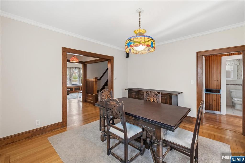 119 Overpeck Avenue Ridgefield Park, NJ 07660 - Photo 6 of 44 a view of a dining room with furniture and wooden floor