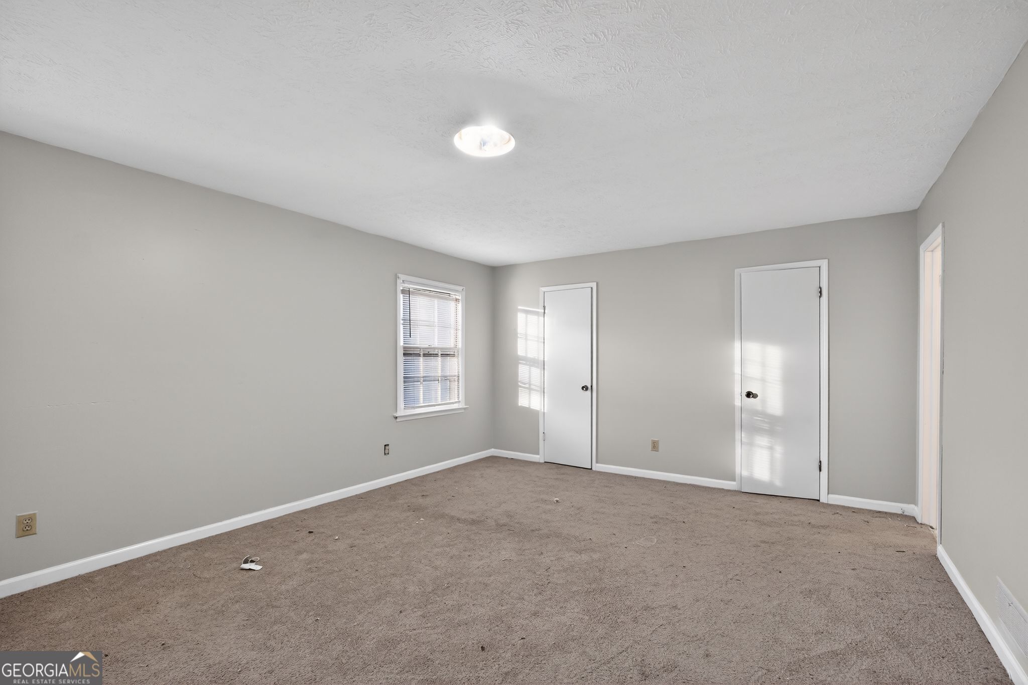 2653 Lester Street Atlanta, GA 30344 - Photo 20 of 34 a view of an empty room with a window