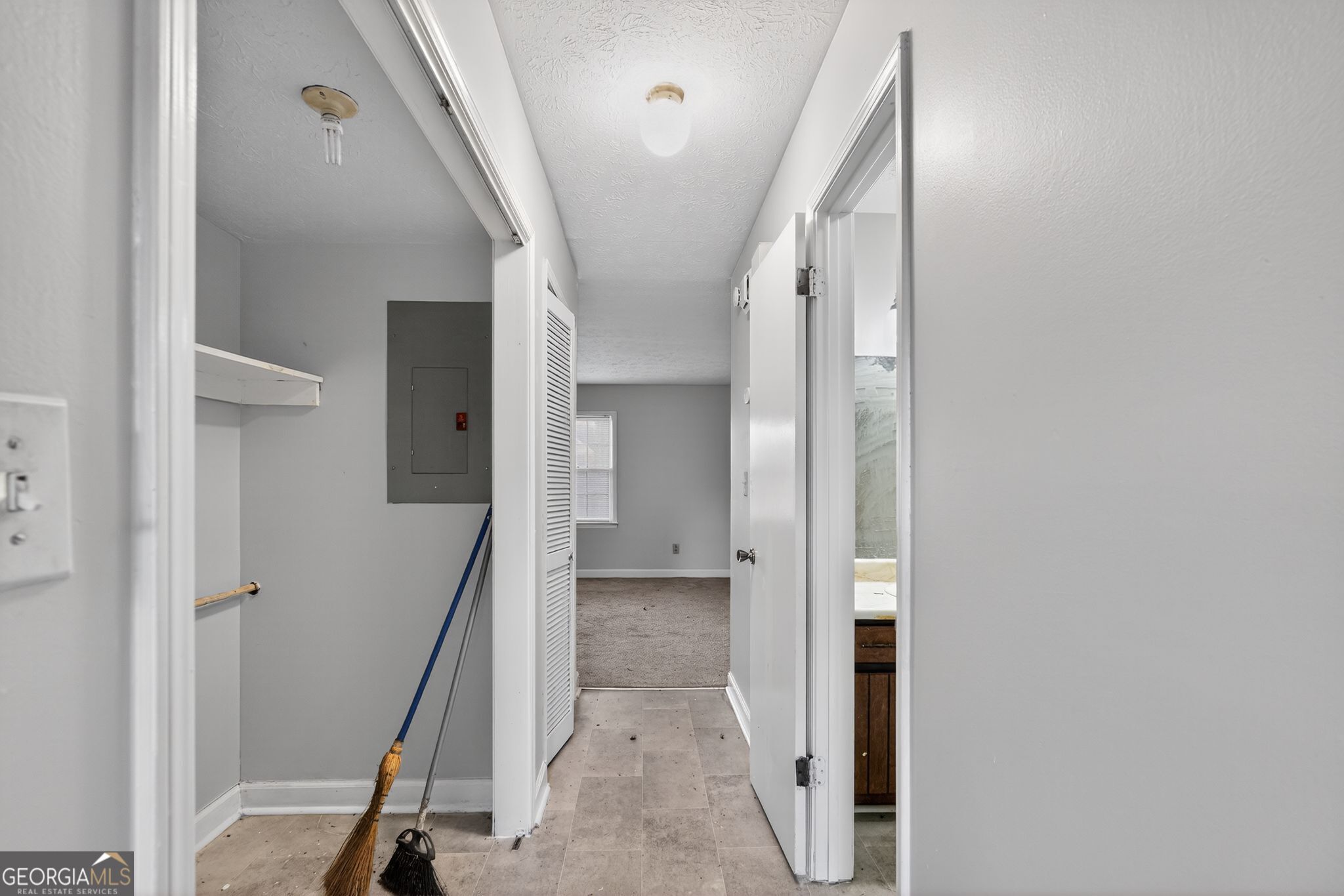 2653 Lester Street Atlanta, GA 30344 - Photo 27 of 34 a view of a hallway with staircase