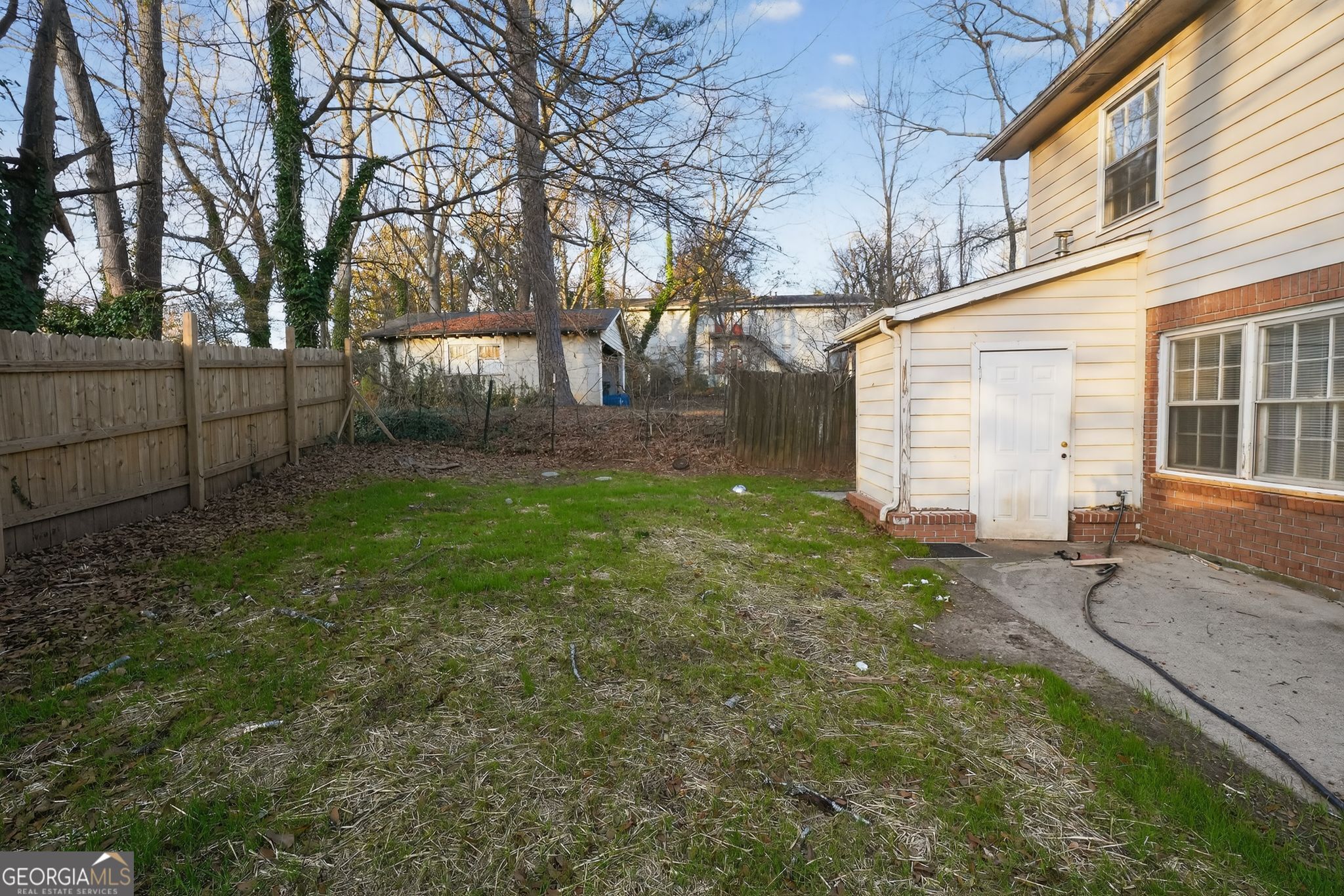 2653 Lester Street Atlanta, GA 30344 - Photo 31 of 34 a backyard of a house with lots of green space